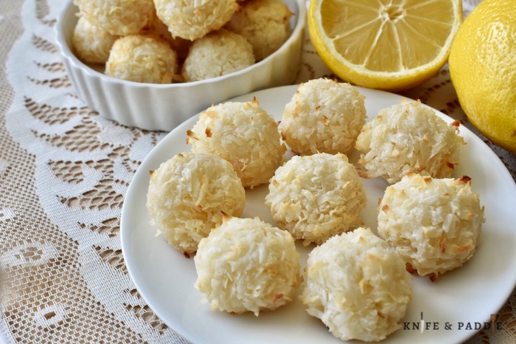 Simple lemon macaroons in a bowl and on a plate