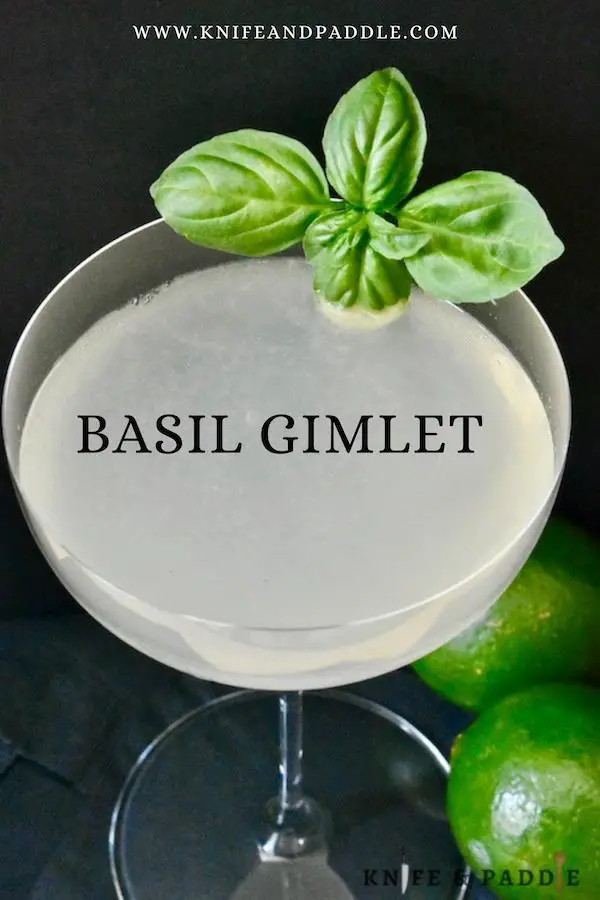 Basil gimlet in a coup glass