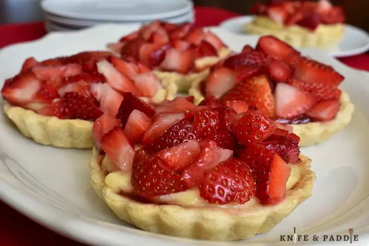 Mini Strawberry & Cream Tartlets on a plate