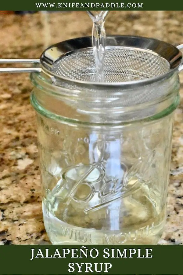 Jalapeño Simple Syrup strained into a mason jar