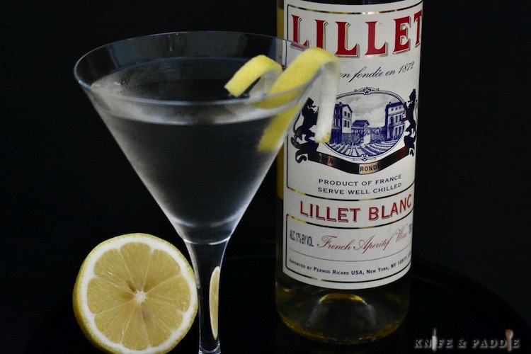 Vodka, gin and Lillet Blanc in a cocktail glass with a lemon twist