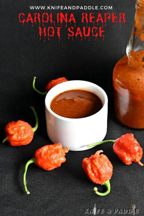 Carolina Reaper Hot Sauce in a bowl and a bottle