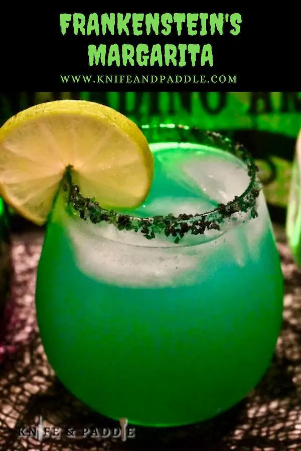 Tequila, blue curaçao, lime and pineapple juices in a salted rim stemless wine glass