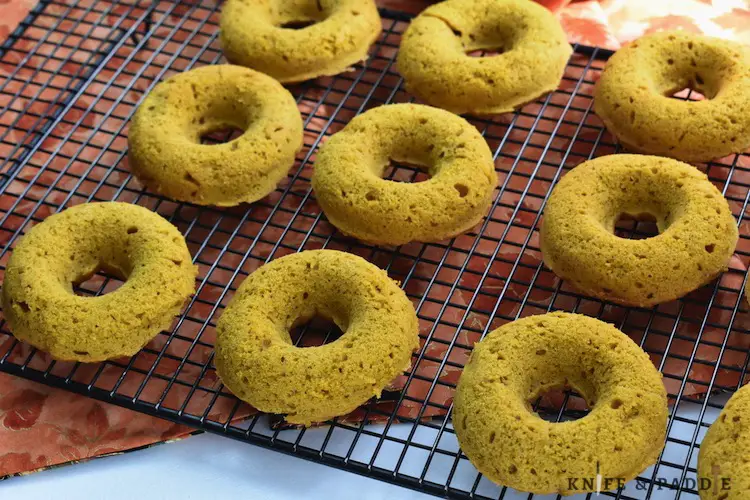 Pumpkin Donuts cooling on a wire rack