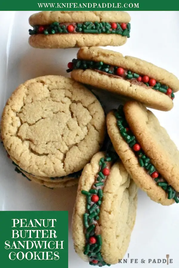 Peanut Butter Sandwich Cookies on a plate with Christmas sprinkles