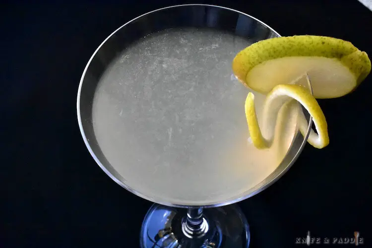 Pearl Martini with pear slice and lemon twist for garnish