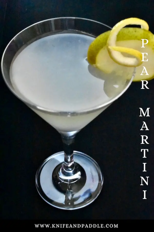 Pear martini garnished with a pear slice and lemon twist