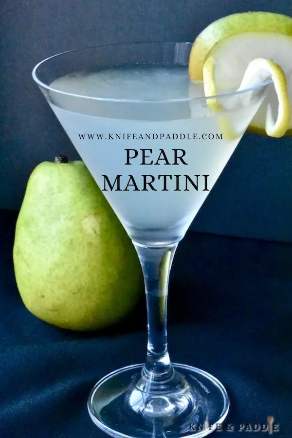Pear martini garnished with a pear slice and lemon twist