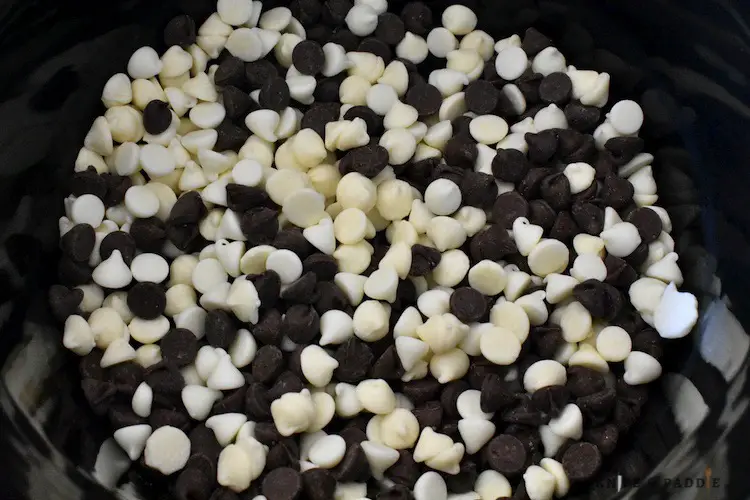 Chocolate and vanilla chips in a crockpot