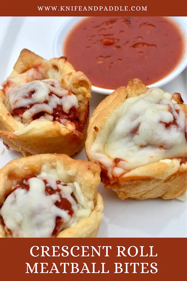 Crescent Roll Meatball Bites with a side of marinara sauce 
