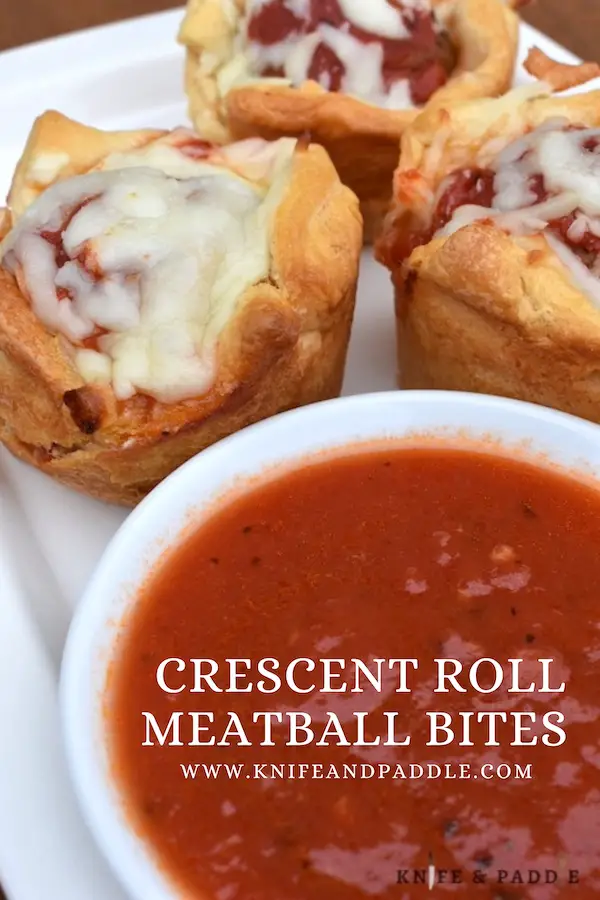 Crescent Roll Meatball Bites with a side of marinara sauce 