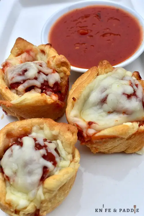 Pillsbury roll appetizer with marinara sauce, cheese and meat