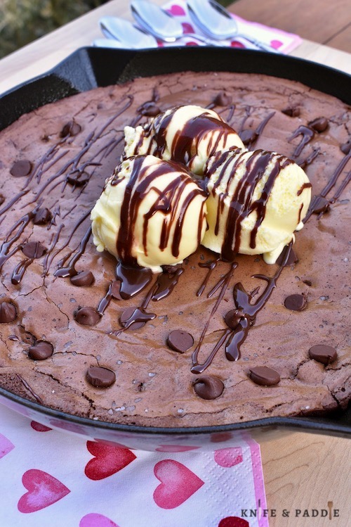Chocolate Skillet Brownie topped with vanilla ice cream and hot fudge