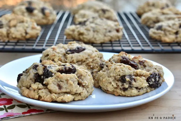 Easy Oatmeal Raisin Cookies on a wire rack and on a plate