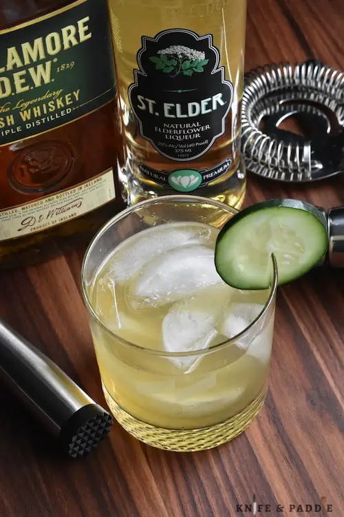 Whiskey, Elderflower liqueur, cucumber, fresh squeezed lemon juice, and simple syrup shaken and strained into an ice filled glass