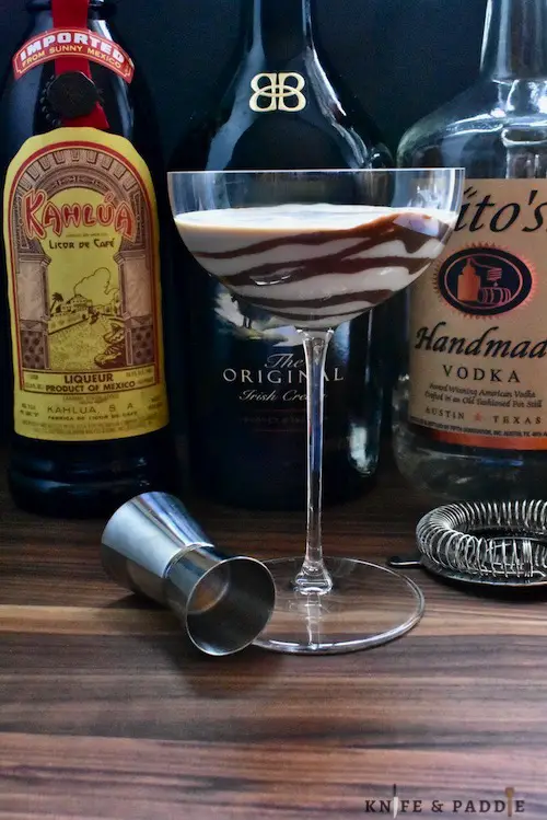 Tito's, Bailey's and Kahlúa shaken and strained into a coup glass