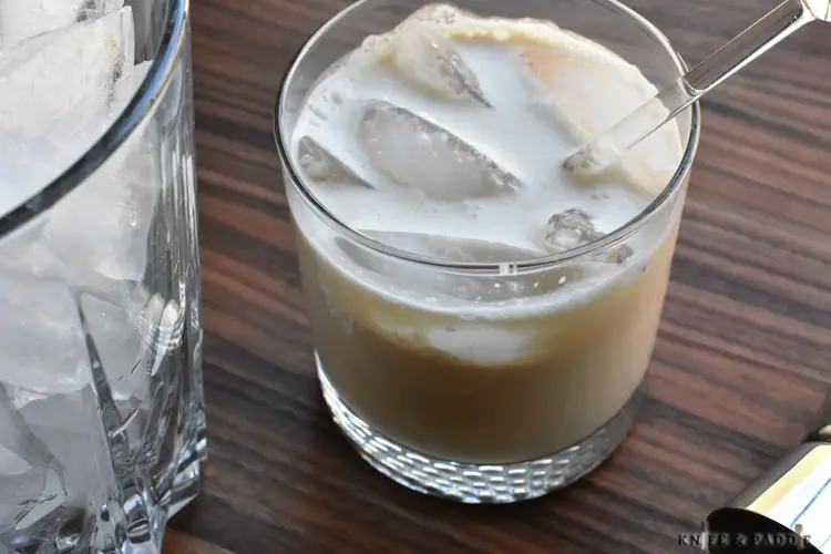 Ice bucket, Kahlúa and vodka mixed with heavy cream served in a lowball glass
