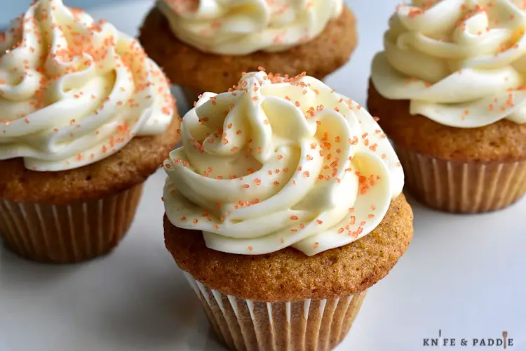 Mini Carrot Cake Cupcake with cream cheese frosting and orange coarse sparkling sugar