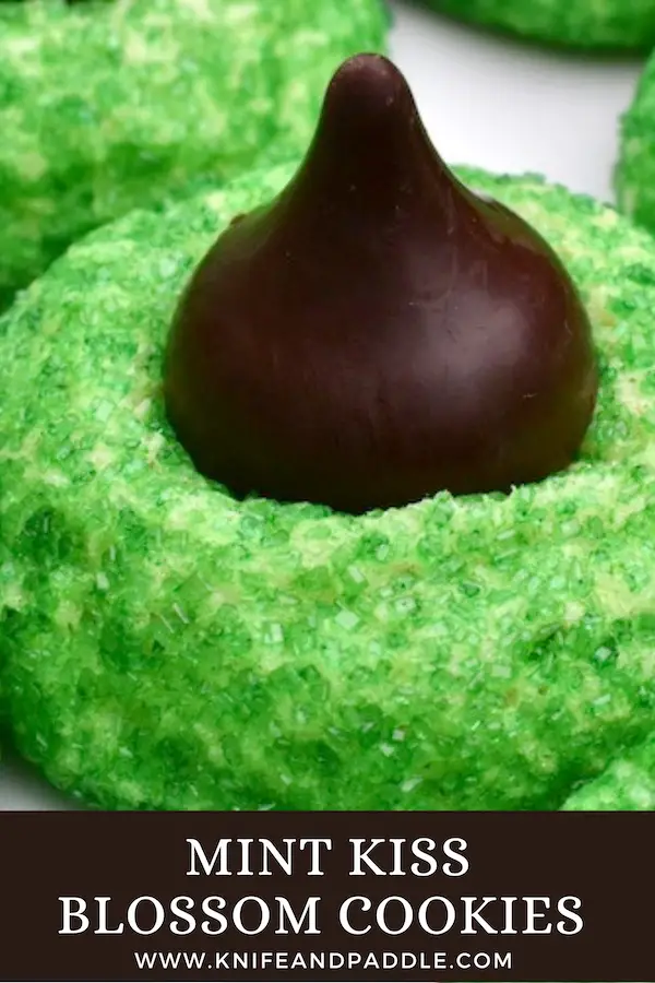 Hershey's Kisses atop a green sugar cookie