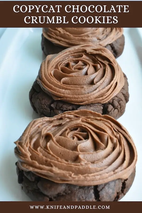 Copycat Chocolate Crumbl Cookies on a plate frosted with chocolate buttercream frosting