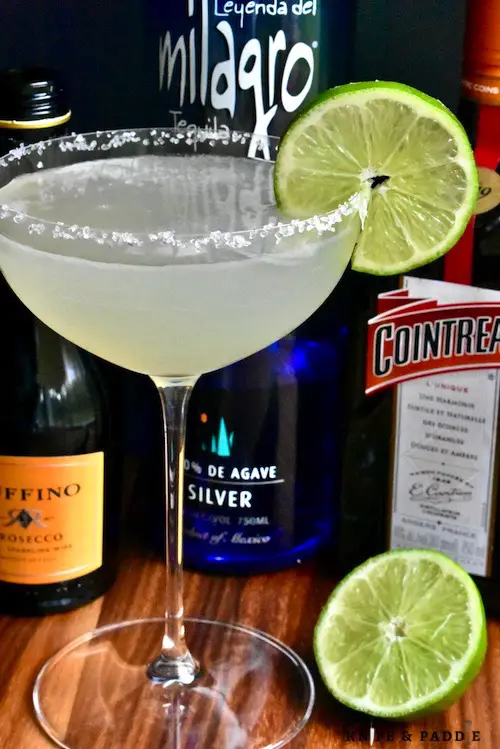 Sparkling Margarita, Cointreau, tequila and Prosecco in a coupe glass garnished with a lime slice