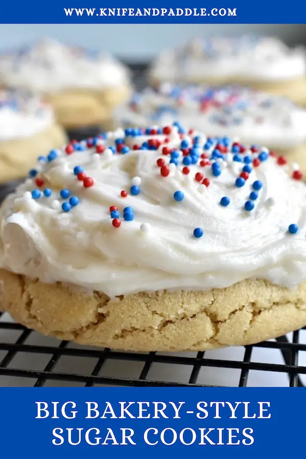 Big Bakery-Style Sugar Cookies with vanilla frosting and red, white and blue sprinkles