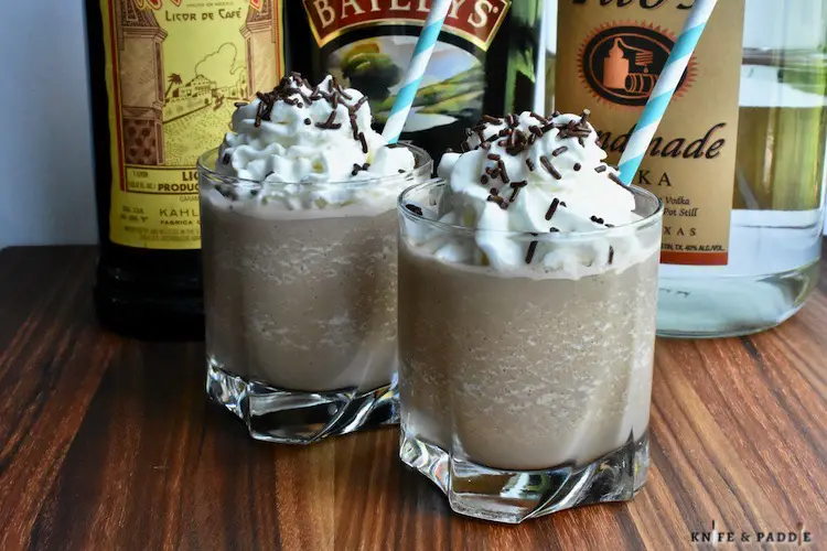 Kahlúa, Baileys and Vodka blended with ice and chocolate syrup into a delicious drink topped with whipped cream and chocolate sprinkles