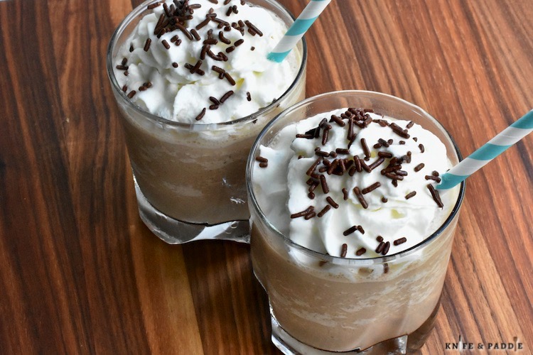ice, vodka, Kahlúa, Baileys, chocolate syrup blended into a cocktail and topped with whipped cream and chocolate sprinkles