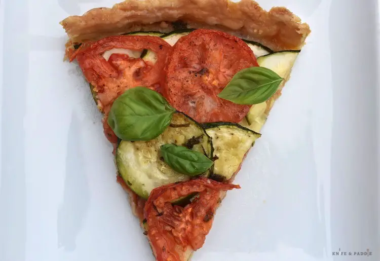 Slice of vegetable pie on a dish 