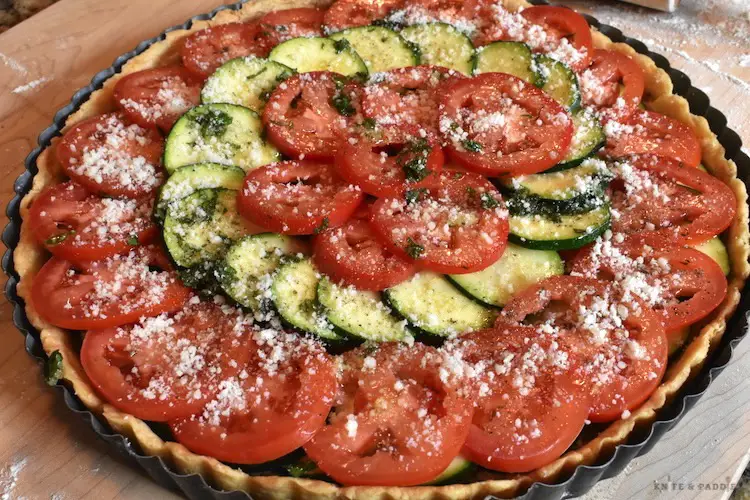 Fresh Zucchini and Tomato Tart in a tart pan