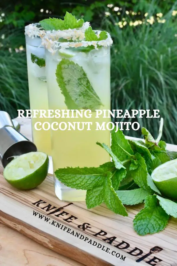 Tropical summer cocktail with fresh mint and a mixture of juices