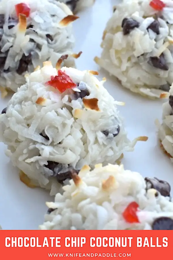 5 Ingredient Chocolate Chip Coconut Balls topped with a piece of maraschino cherry