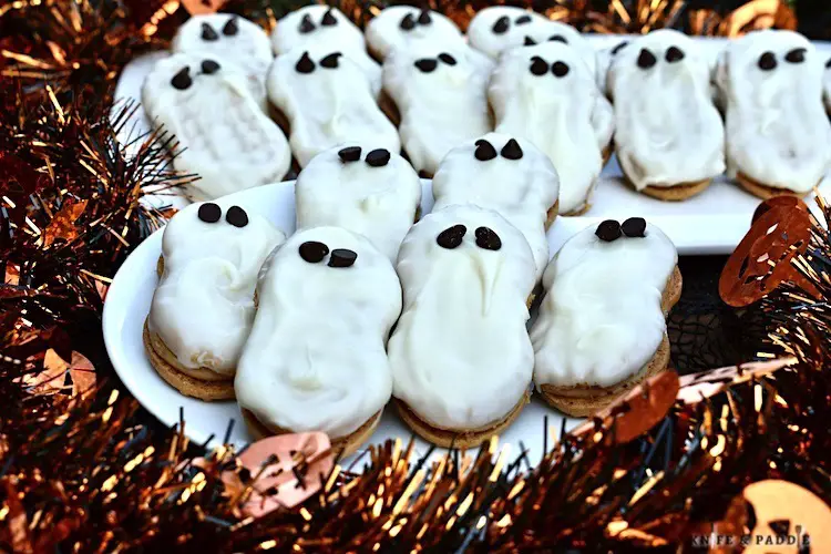 White Chocolate Dipped Cookies on a plate for Halloween
