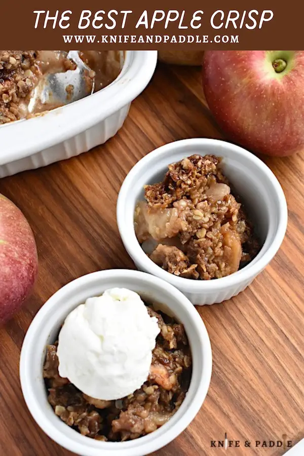 The Best Apple Crisp in a bowl topped with vanilla ice cream