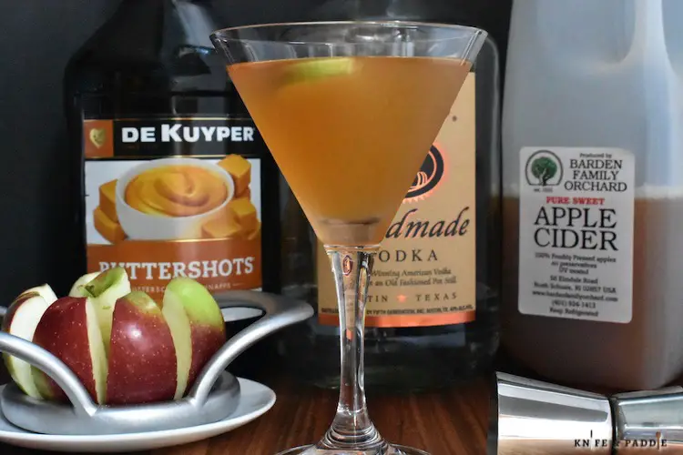 Butterscotch schnapps, vodka and cider mixed together in a fall cocktail