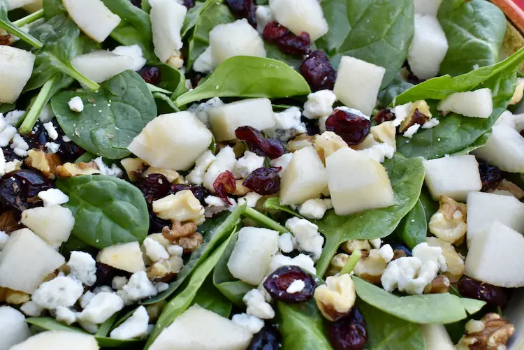 Pears, walnuts, blue cheese, and crasins mixed with baby spinach