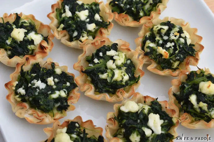 Spinach, feta, garlic, salt, pepper mixed and baked in phyllo cups