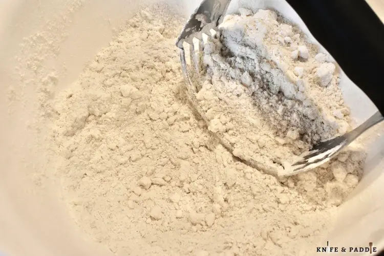 Flour, sugar, baking powder, salt and butter cut with a pastry cutter to resemble coarse crumbs