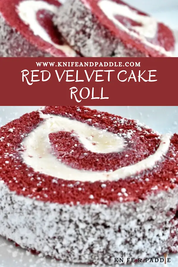 Red Velvet Cake Roll with cream cheese filling and topped with powdered sugar cut into slices