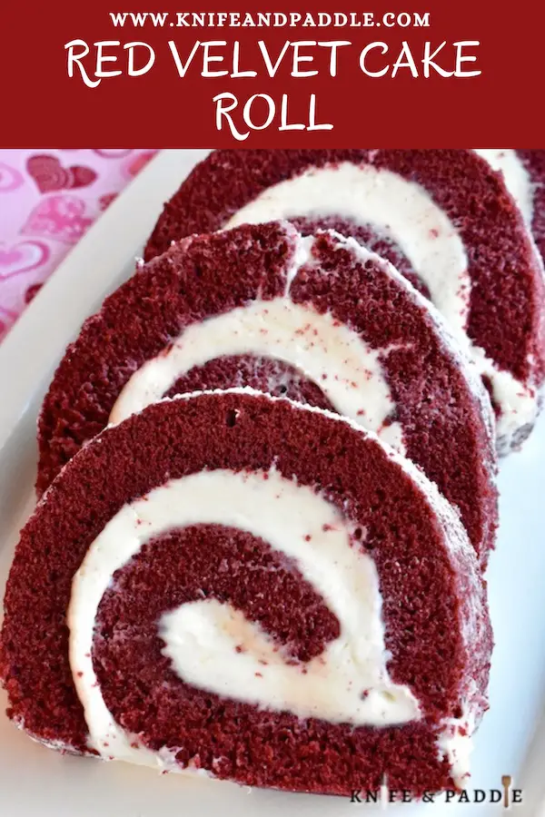 Festive Valentine's Day dessert with cream cheese filling cut into slices and sprinkled with powdered sugar 