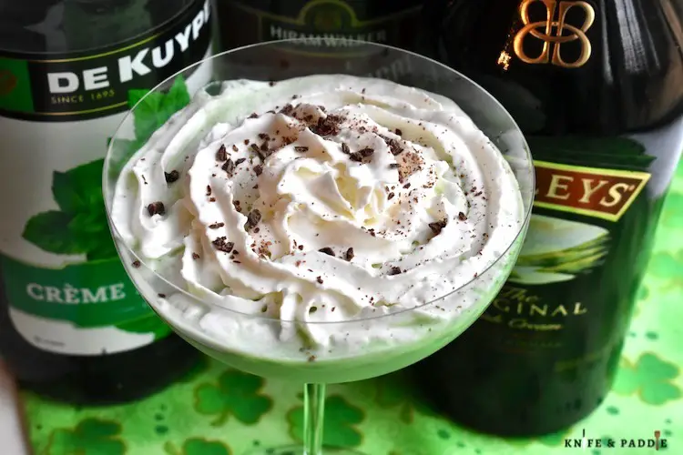 St. Patrick's Day Cocktail:  Crème de Menthe, Crème de Cacao and Irish Cream served in a coup glass and garnished with whipped cream and chocolate shavings