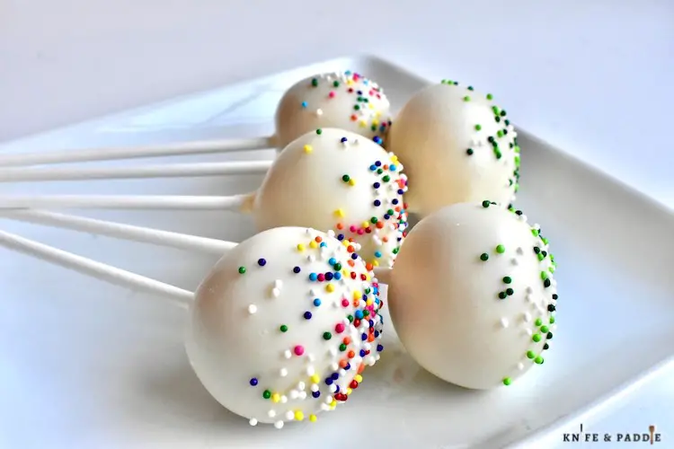 Candy coated bite-sized treat on a stick
