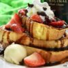 Baileys French Toast with chocolate sauce, maple syrup, chocolate chips, strawberries and whipped cream