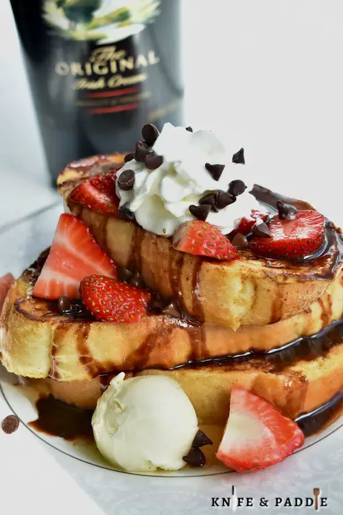 Baileys French Toast with chocolate sauce, maple syrup, chocolate chips, strawberries and whipped cream