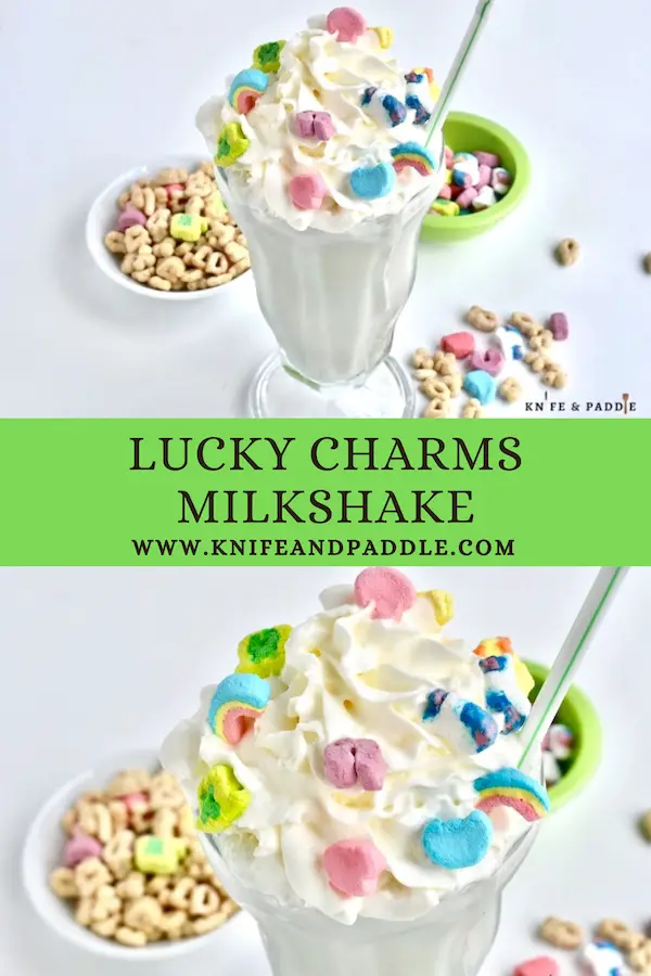 Lucky Charms Milkshake topped with whipped cream and Lucky Charms marshmallows