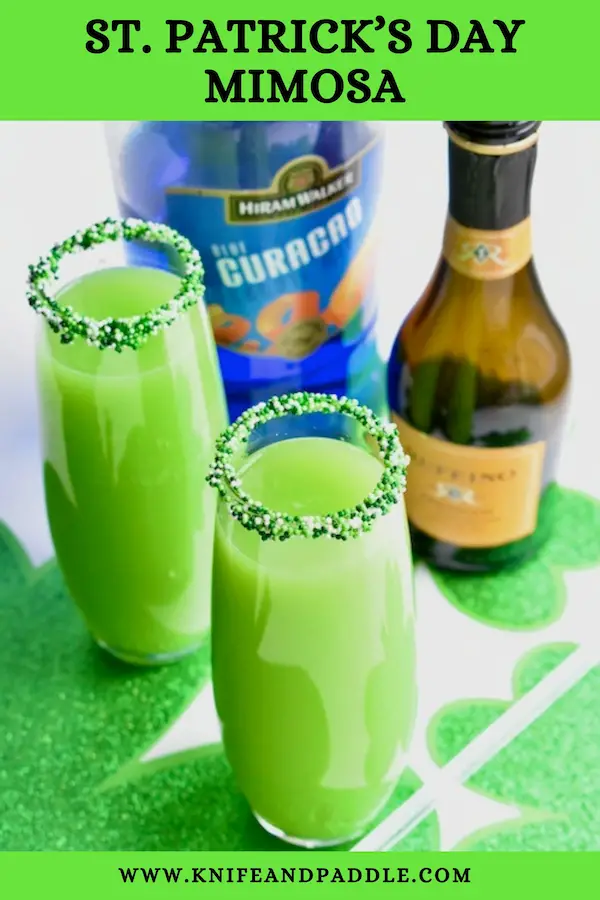 St. Patrick's Day Mimosas served in large Champagne flutes
