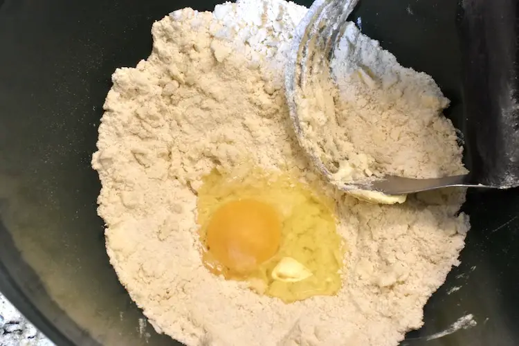 flour, sugar, egg and butter (softened) in a mixing bowl 