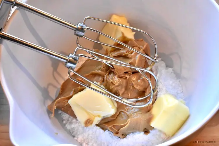 Peanut butter, softened butter and powdered sugar in a mixing bowl