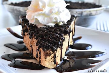 Creamy Peanut Butter Pie with chocolate drizzle and whipped cream