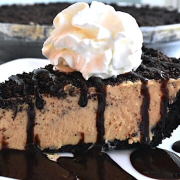 Creamy Peanut Butter Pie with chocolate drizzle and whipped cream